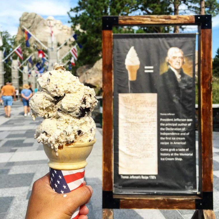 melting ice cream cone in front of Mount Rushmore