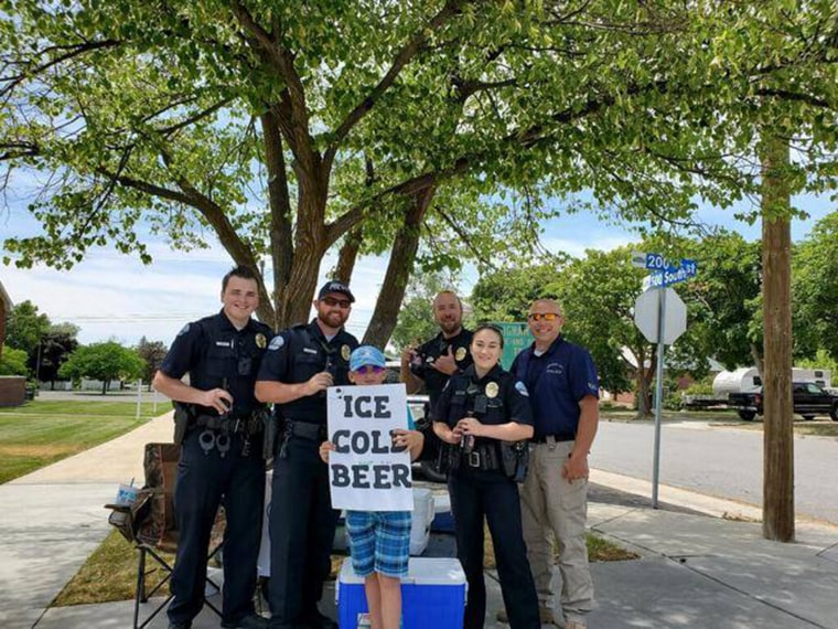 The Brigham City Police Department posed for a photo with Seth Parker. 