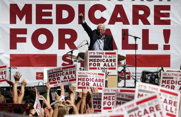 Image: Sanders speaks during a health care rally
