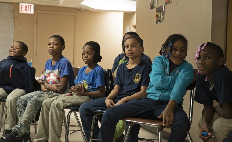 Children in Chicago attend a "know your rights" training as part of the Future Ties after-school program.