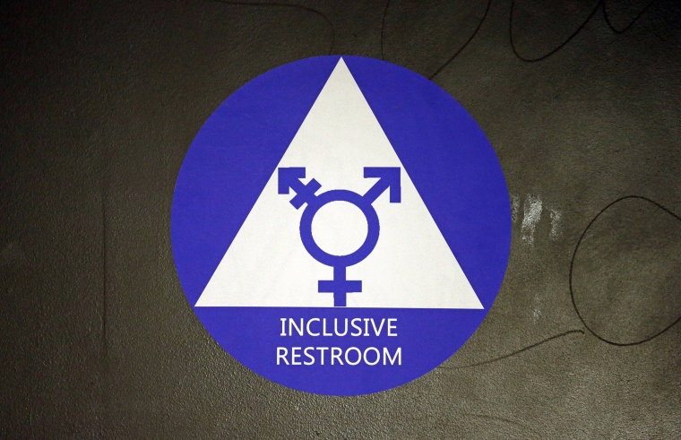 Image: A sticker designates a gender neutral bathroom at Nathan Hale high in Seattle.