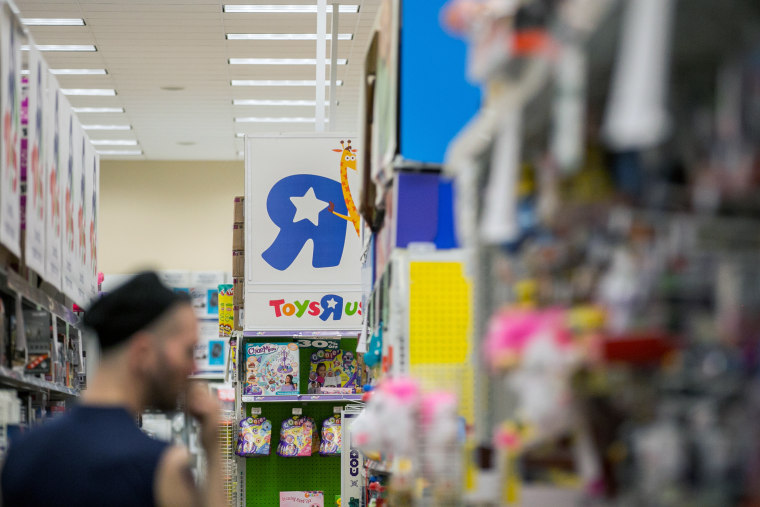 A customer views merchandise at a Toys 'R' Us store in New York