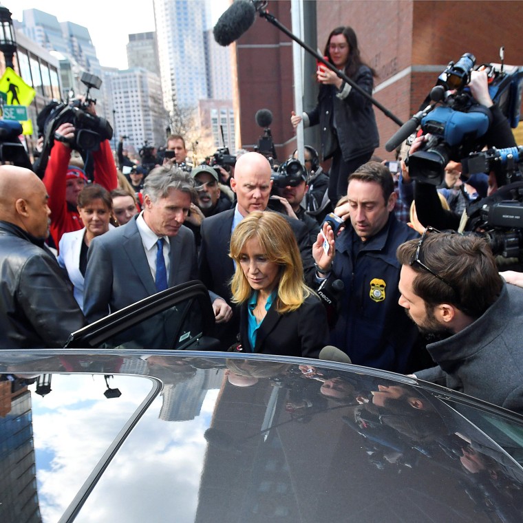 Image: Actor Felicity Huffman leaves the federal courthouse after facing charges in a nationwide college admissions cheating scheme in Boston