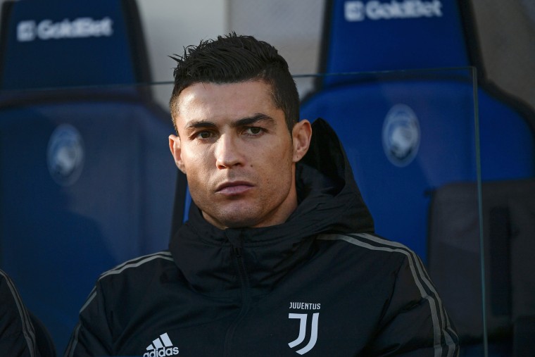 Cristiano Ronaldo looks on from the bench prior to a match on Dec. 26, 2018.