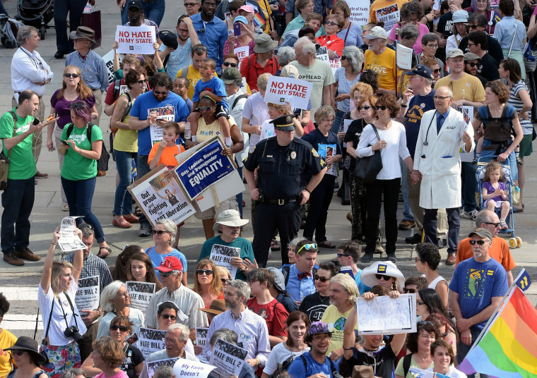Image: Protesters prepare for a sit-in against House Bill 2, a Republican-backed law curtailing protections for LGBT people and limiting public bathroom access for transgender people, in Raleigh, North Carolina, on April 25, 2016.