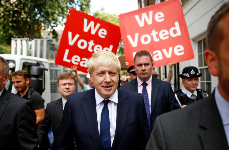 Image: Boris Johnson leaves his office in London