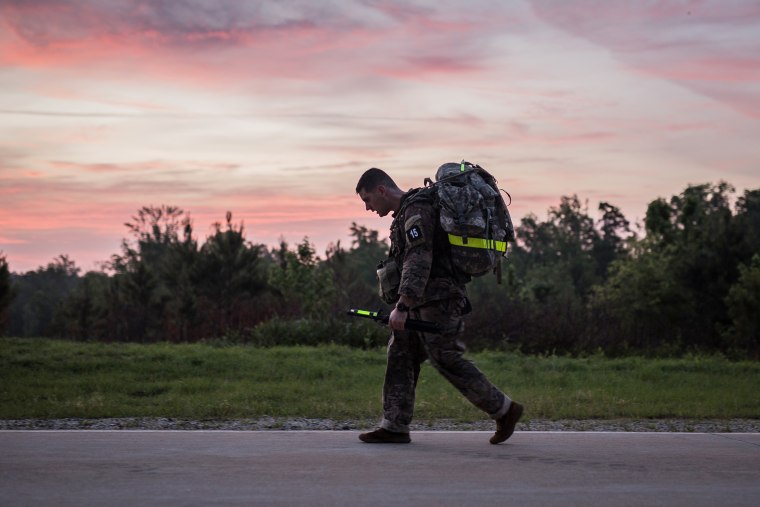 An Army Ranger trainee completes a 12-mile march at Fort Benning in Georgia while wearing heat sensors under his uniform to measure his core temperature and heart rate.