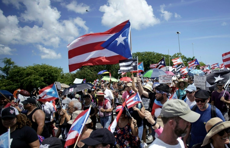 Image: People march across the Las Americas Highway as protests continue in San Juan, Puerto Rico, on July 22, 2019.