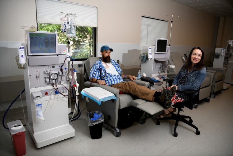 Image: Sovereign Valentine and his wife, Jessica, wait for a dialysis machine to filter his blood. Before finding a dialysis clinic in their insurance network, the Valentines were charged more than half a million dollars for 14 weeks of the treatment.