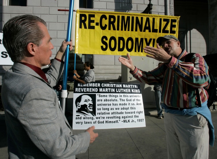 Gay marriage opponent Don Grundmann, left, argues with a supporter of gay marriage outside  the California Supreme Court in San Francisco on March 4, 2008.