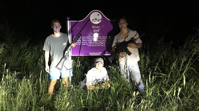 Three Ole Miss students posed in front of the Emmett Till memorial sign in Tallahatchie County, Mississippi.