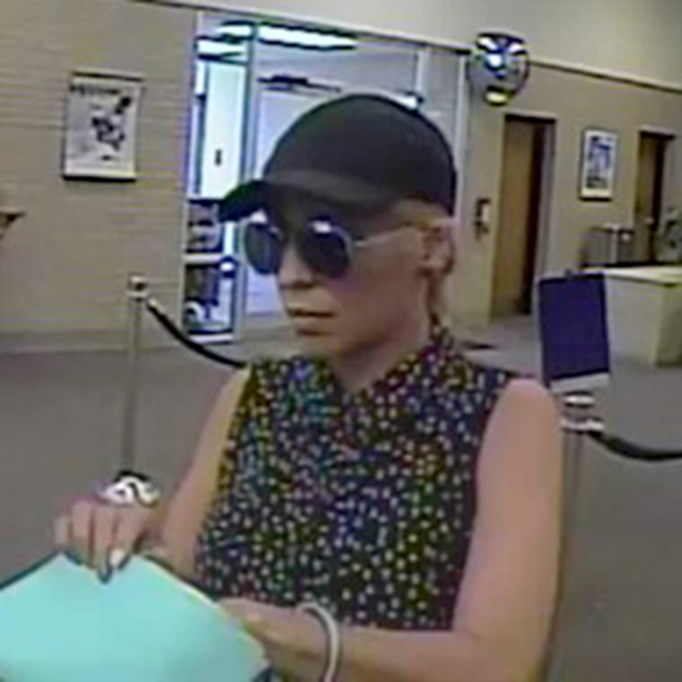 Image: Police are searching for a suspect, dubbed the "Pink Lady Bandit," who is believed to have robbed banks in at least three states on the East Coast.