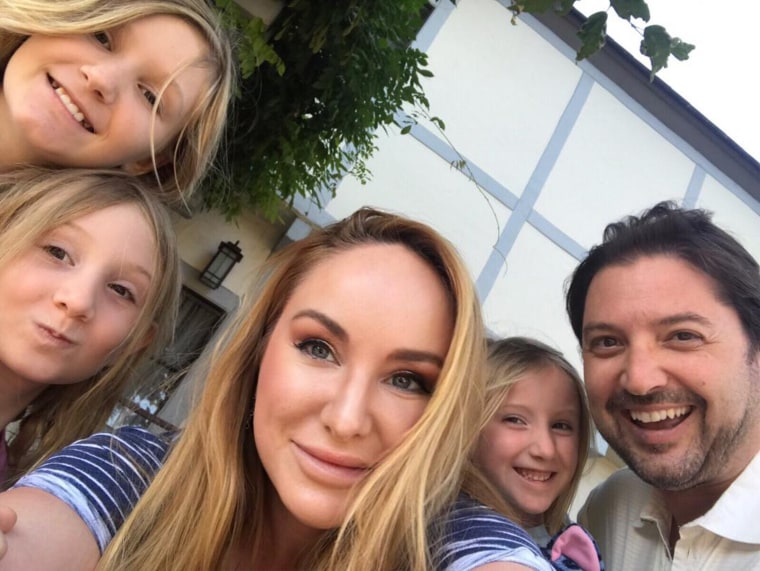 "...Assigning focus on gender at birth leaves out so much of their potential and talents that have nothing to do with what's between their legs," Jenna Karvunidis, pictured here with husband Niko and daughters Bianca, 10, Stella, 8, and Greta, 5, said now of gender reveal parties. 