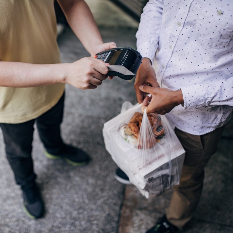 Paying takeout food with credit card