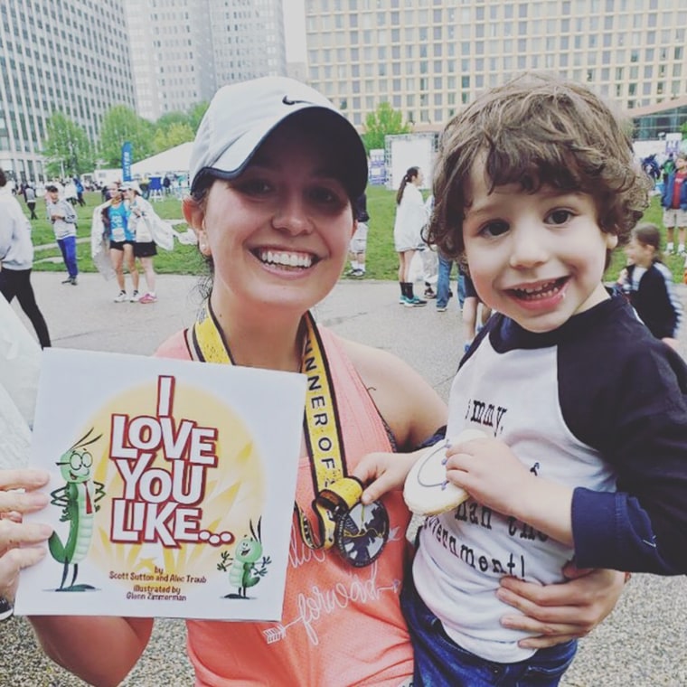 Anne Sutton and her son, Alec Sutton, are pictured with the "I Love You Like..." book.