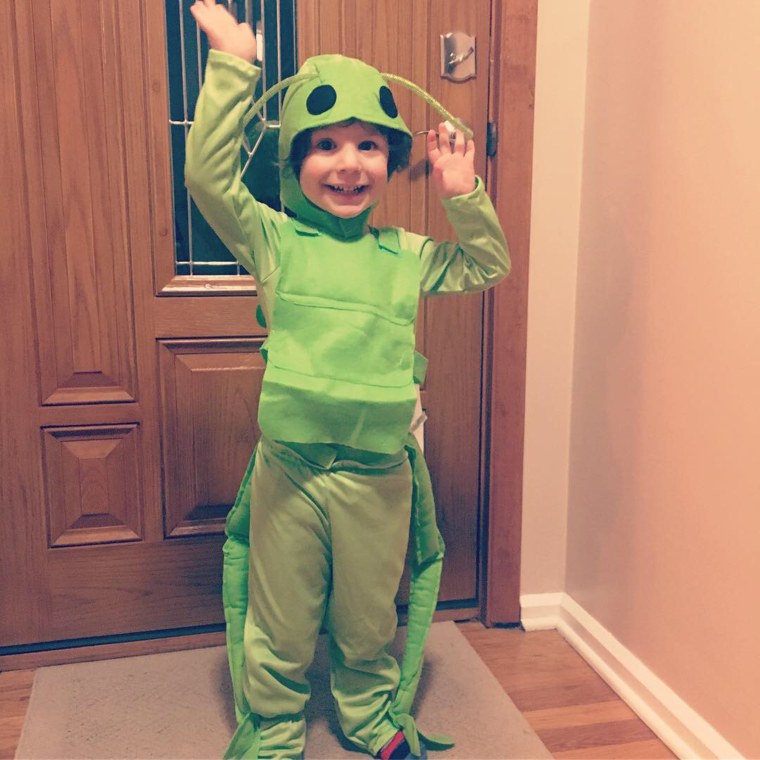 Young Alec Sutton dressed as a grasshopper for Halloween.