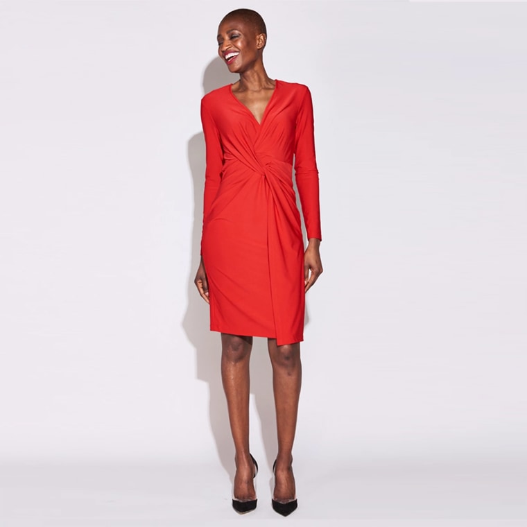 The Serena Twist Front Dress modeled in red.