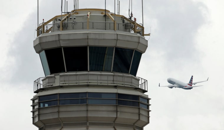Image: A plane takes off from Ronald Reagan Washington National Reagan Airport