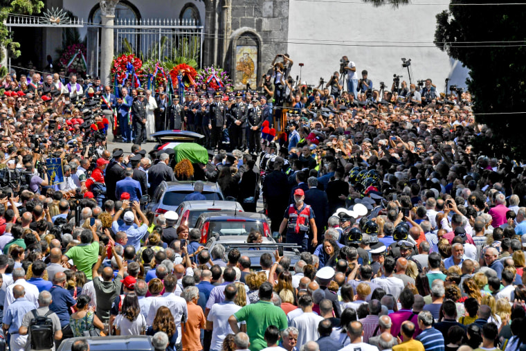 Image: Crowds gather at the funeral procession for Officer Mario Rega in his hometown of Somma Vesuviana, near Naples in southern Italy