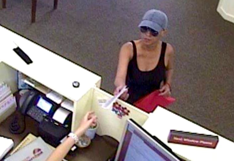 Image: A suspect dubbed the "Pink Lady Bandit" is believed to have robbed banks in at least three states on the East Coast.