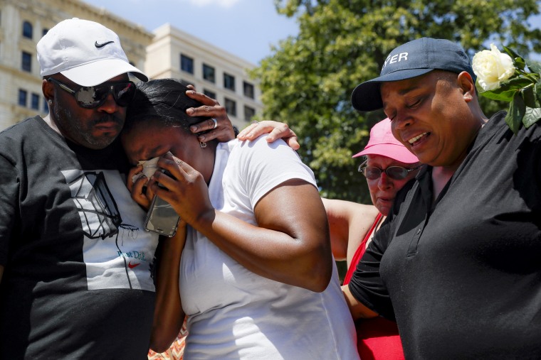 Image: Mourners gather for a vigil after a mass shooting in Dayton, Ohio, on Aug. 4, 2019.