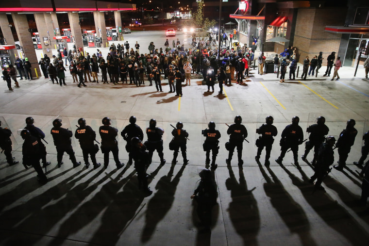 Image: Demonstrators protesting the killings of 18-year-olds Michael Brown by a Ferguson