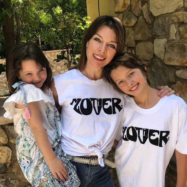 Pregnant Milla Jovovich Spends New Year's with Her Family: Photos