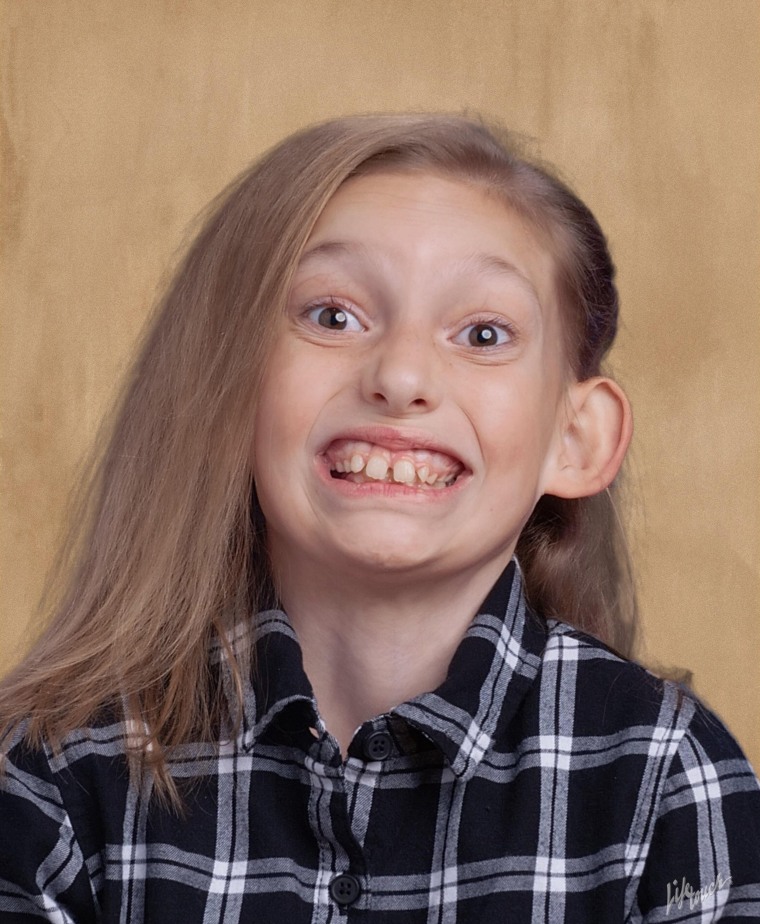 "Thanks for the laugh, School Photographer," said Mia Carella when she saw daughter Evalyn's photo last year.