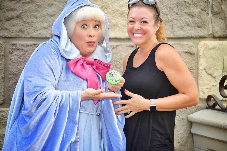 Disney's Fairy Godmother really supported Lisa DiNoto's solo walk through the Magic Kingdom, celebrating the first day of school. She gave DiNoto her own bag of pixie dust that she didn't have to share with her 6 or 9 year old sons. 