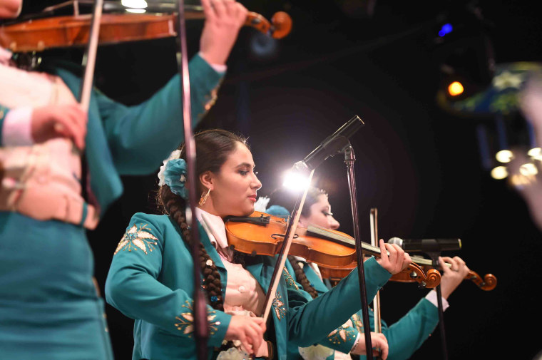 Violinist Karyme Perea is a member of an all-female mariachi band in El Paso, Texas, where a mass shooter gunned down 22 people on Aug. 3, leaving Latinos, including members of Mariachi Femenil Flores Mexicanas, feeling vulnerable.