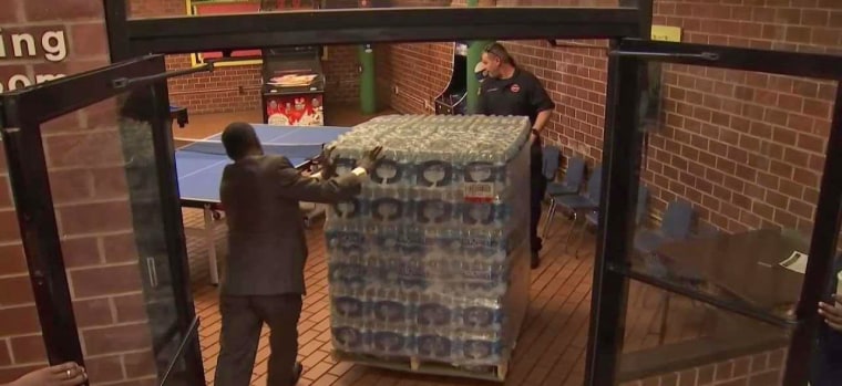 Newark is handing out bottled water to residents after tests proved the water of many in the city is not safe to drink.