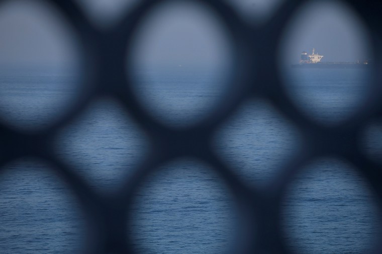 Image: Iranian oil tanker Grace 1 sits anchored after it was seized in July by British Royal Marines, in the Strait of Gibraltar