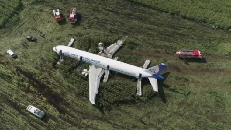 Image: A view shows a passenger plane following an emergency landing near Moscow