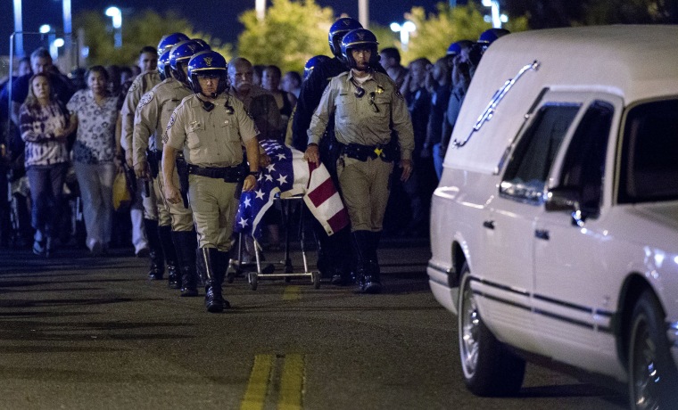 The casket of slain CHP officer Andre Moye is transported to a hearse from the Riverside University Health Systems Medical Center in Riverside in Moreno Valley, Calif., on Aug 12, 2019. Moye was shot and killed while two fellow officers were wounded during a traffic stop.