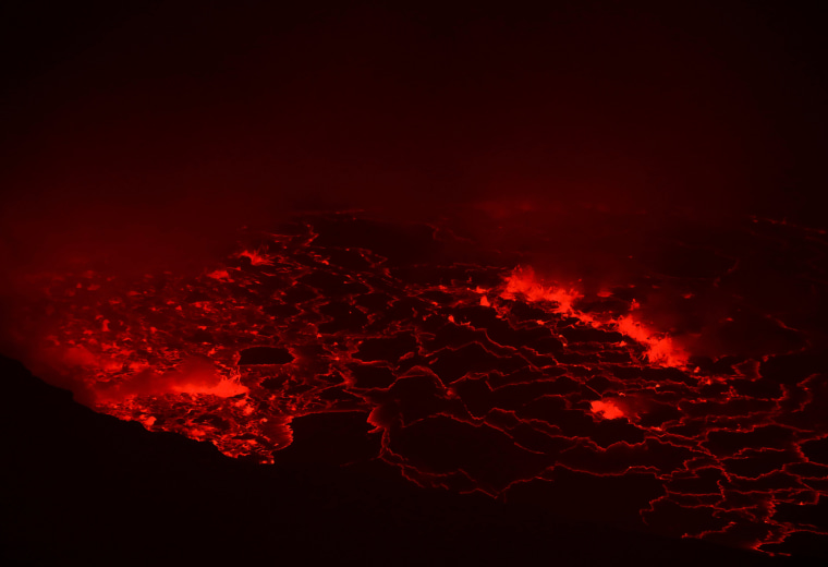 Lava glows inside the crater of the Nyiragongo volcano inside the Virunga National Park in the Democratic Republic of Congo on Aug. 9, 2019.