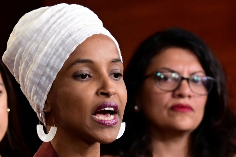 Image: Reps Ilhan Omar (D-MN) and Rashida Tlaib (D-MI) hold a news conference after Democrats in the U.S. Congress moved to formally condemn President Donald Trump's attacks on four minority congresswomen on Capitol Hill