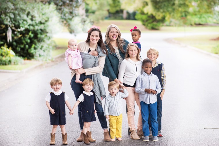 Eliza Morrill and Stephanie Hollifield with their children