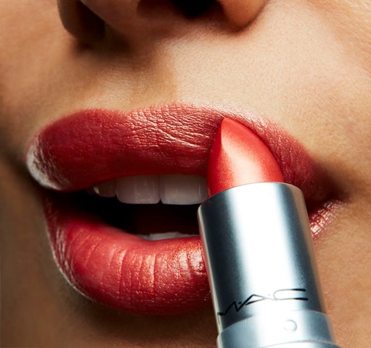 applying MAC lipstick