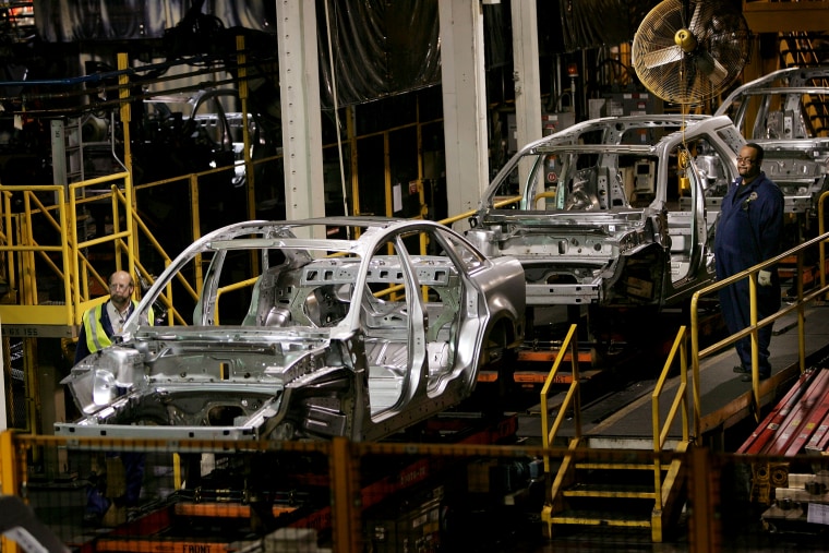 Image: Workers build Ford vehicles at the Torrence Avenue Assembly Plant in Chicago in 2007.