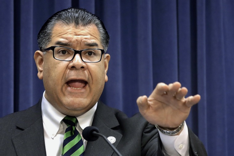 Image: Sen. Martin Sandoval, D-Cicero, speaks during a news conference at the Illinois state Capitol, in Springfield,