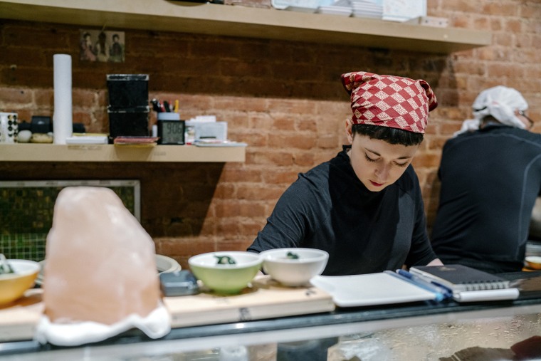 Oona Tempest working at Tanoshi Sushi in Manhattan.