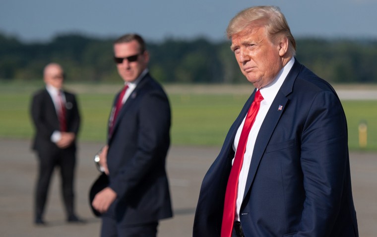 Image: President Donald Trump disembarks from Air Force One at Morristown Municipal Airport in Morristown, N.J. on  Aug. 9, 2019.