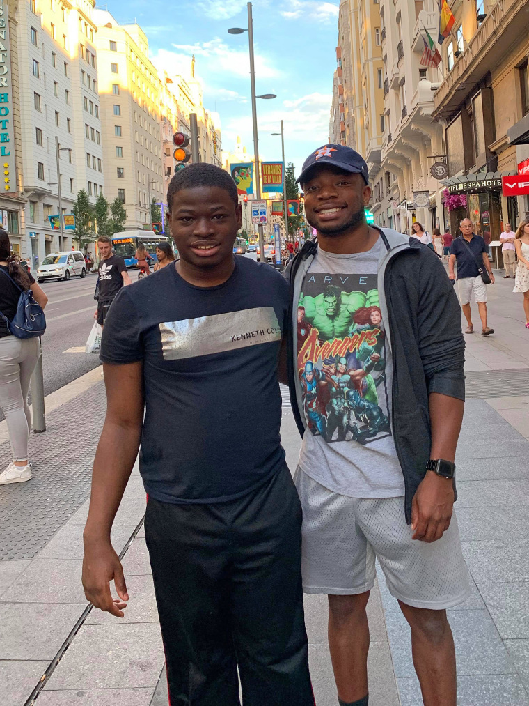 Ayo Isola, right, with his brother, Tayo.