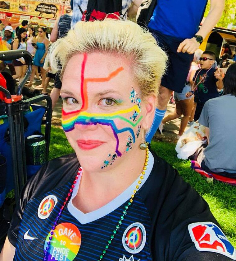 Jessica Strong wearing a Tacoma Reign FC jersey at Seattle Pride in 2018.