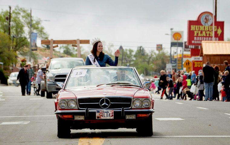 Image: Miss Nevada State Katie Williams waves during a parade in Tonopah on May 25, 2019.
