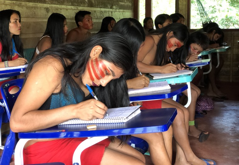 Waiapi students in class at the local open-air schoolhouse.