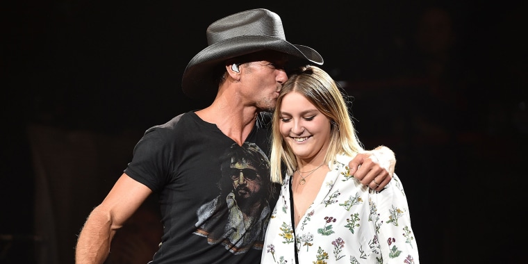 Image: Musician Tim McGraw, left, performs with his daughter Gracie McGraw