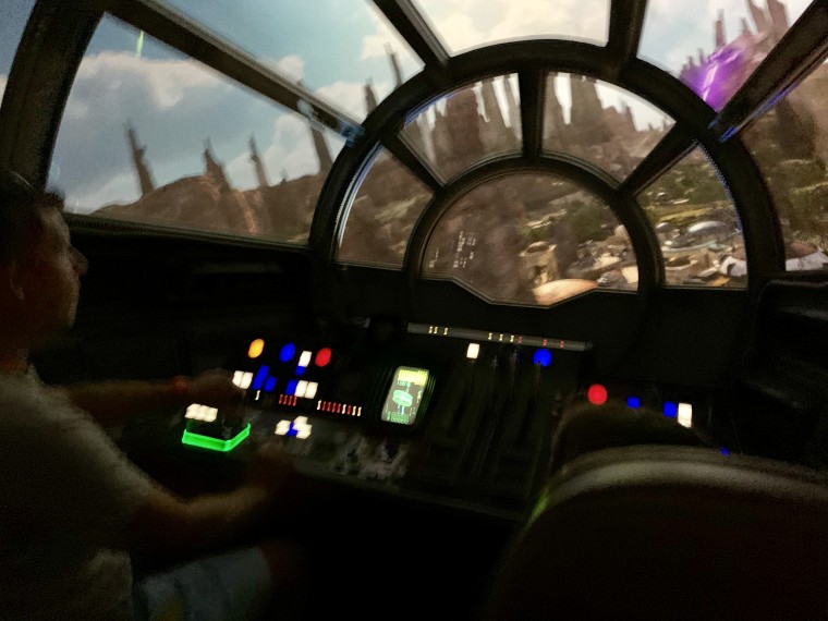 Millennium Falcon: Smuggler's Run is a fast-paced, bumpy adventure. It's helpful to know your role (pilot, gunner or engineer) before you board, but when in doubt, hit the buttons that light up around you.
