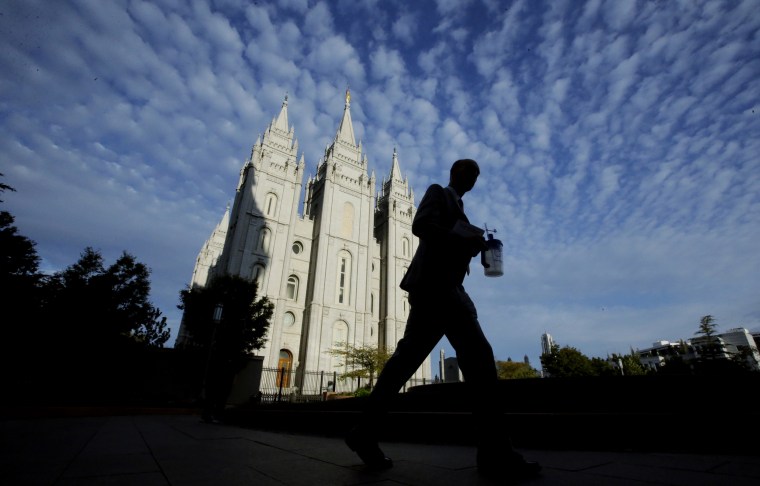 Image: A man walks past The Church of Jesus Christ of Latter-day Saints temple in Salt Lake City, Utah, on Sept. 14, 2016.