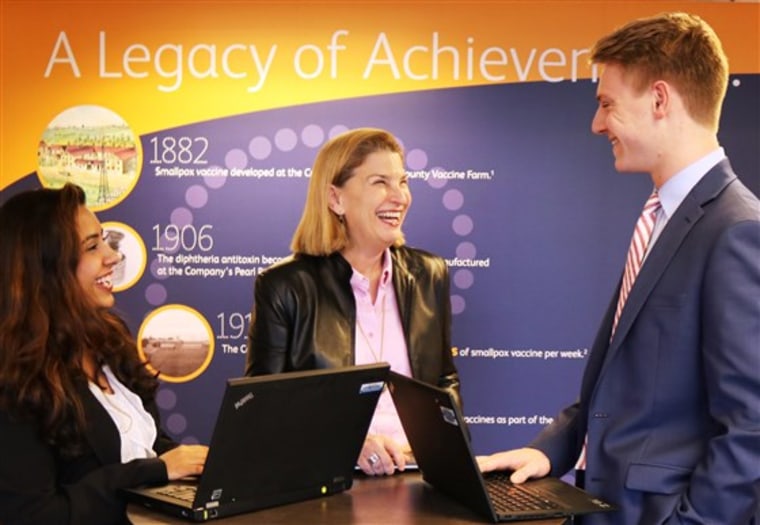 Pfizer's Sally Susman with company interns.